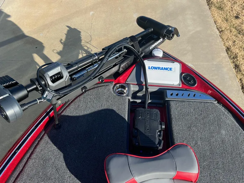 Slide: The Image of 2024 Triton 19 TrX Patriot boat with Lowrance electronics and trolling motor. - 15