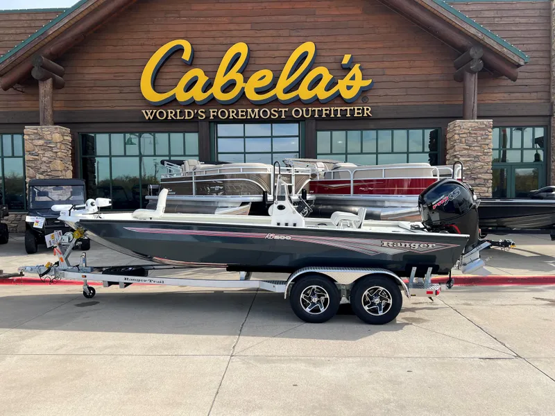 The Image of 2024 Ranger RB200 boat on trailer outside Cabela's store. - 0