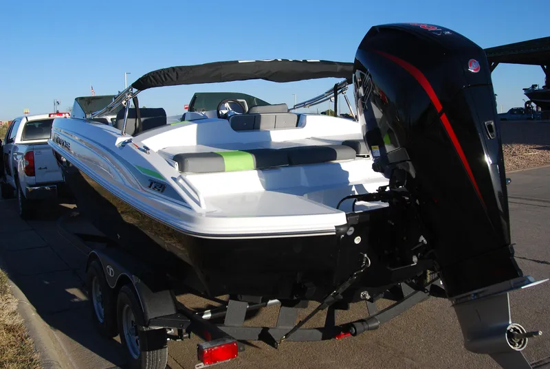 Slide: The Image of 2024 Tahoe T21 boat on trailer with outboard motor. - 4