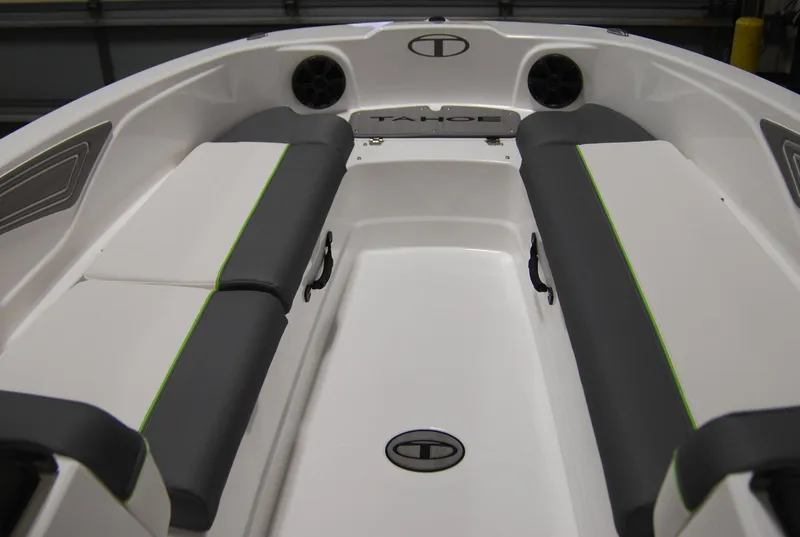 Slide: The Image of 2024 Tahoe T21 boat interior with gray and white seating. - 8