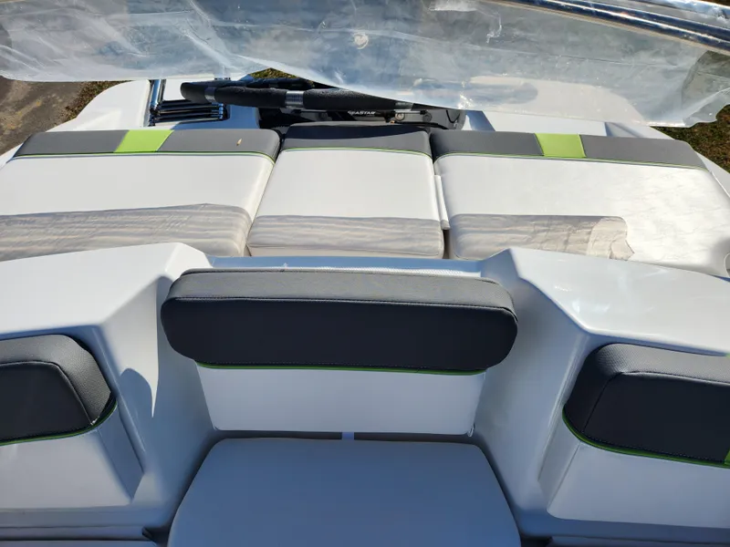 Slide: The Image of 2024 Tahoe T16 boat interior with cushioned seating and modern design. - 15