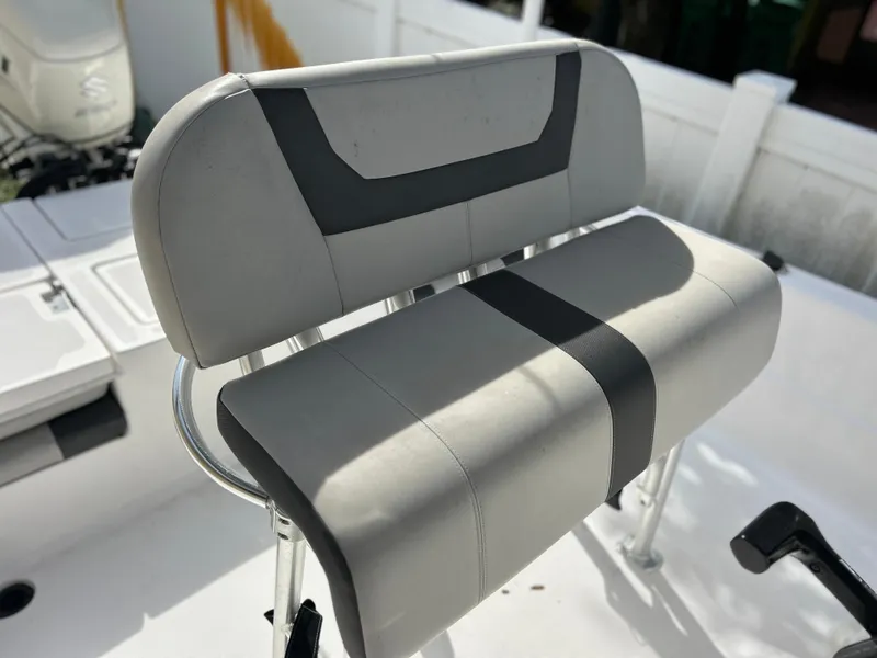 Slide: The Image of 2020 Aquasport 244 Bay boat with cushioned seating. - 38