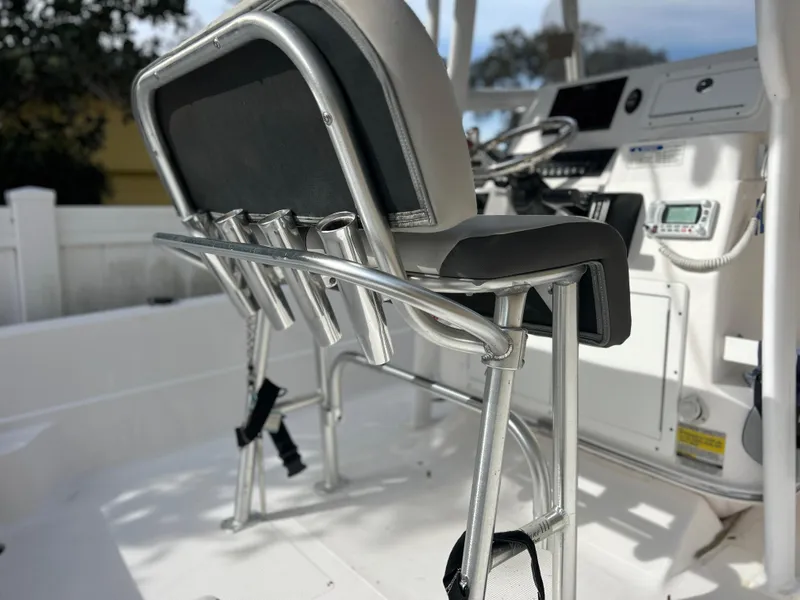 Slide: The Image of 2020 Aquasport 244 Bay boat interior with seating and control console. - 39