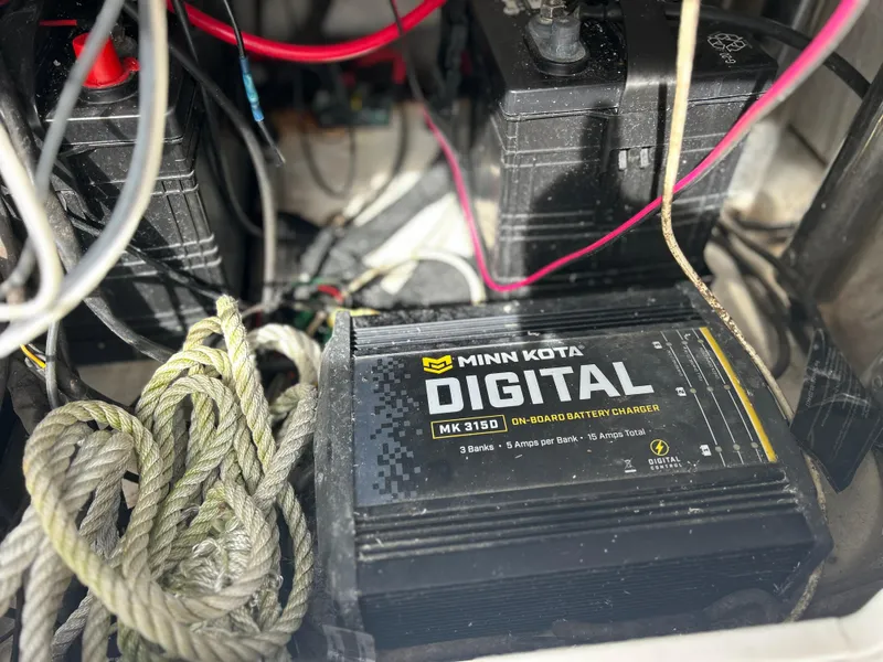 Slide: The Image of Minn Kota Digital MK 315D battery charger in 2020 Aquasport 244 Bay boat. - 40