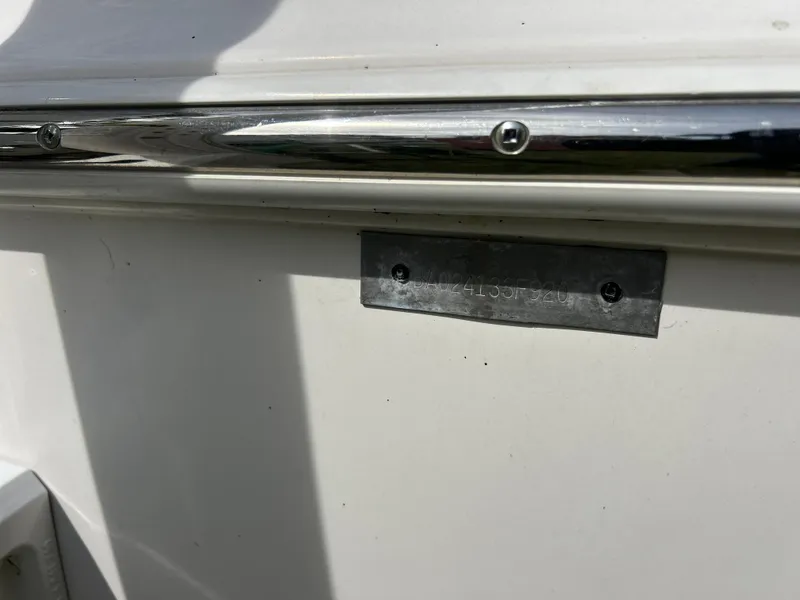 Slide: The Image of 2020 Aquasport 244 Bay boat hull identification number (HIN) plate. - 48