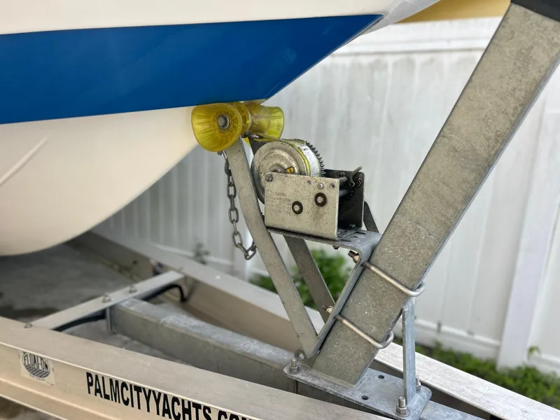 Slide: The Image of Close-up of 2020 Aquasport 244 Bay boat on trailer with winch system. - 8