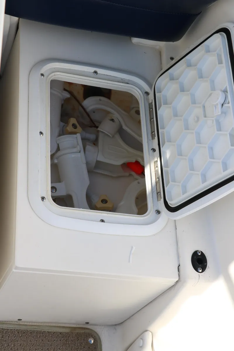 Slide: The Image of Storage compartment on a 2011 Larson LX850 Classic SF boat. - 29