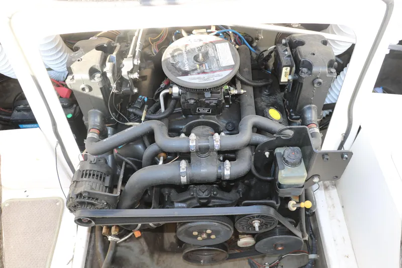 Slide: The Image of Engine compartment of a 2011 Larson LX850 Classic SF boat. - 30
