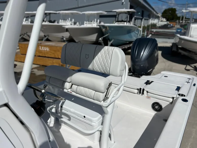 Slide: The Image of 2024 Sea Fox 251 Bay Fox boat deck with storage compartments. - 15