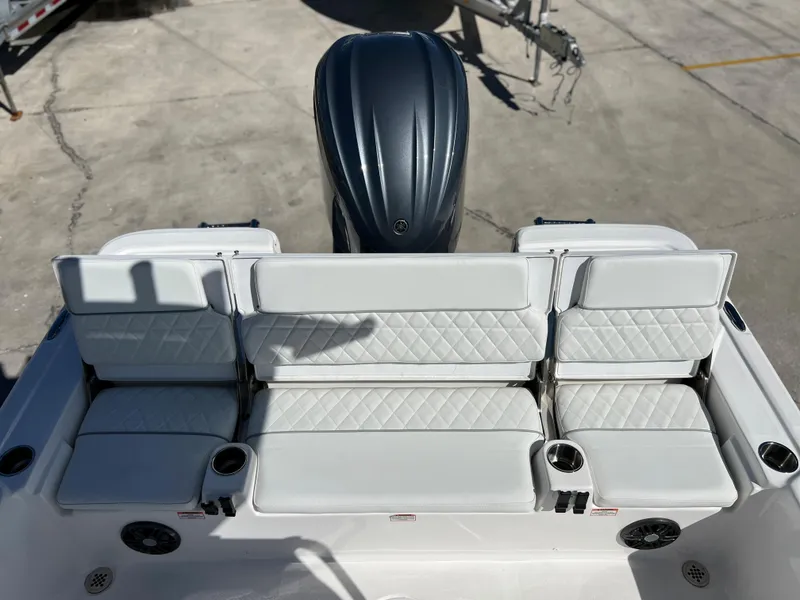 Slide: The Image of 2024 Sea Fox 251 Bay Fox console with control panel and storage compartment. - 26