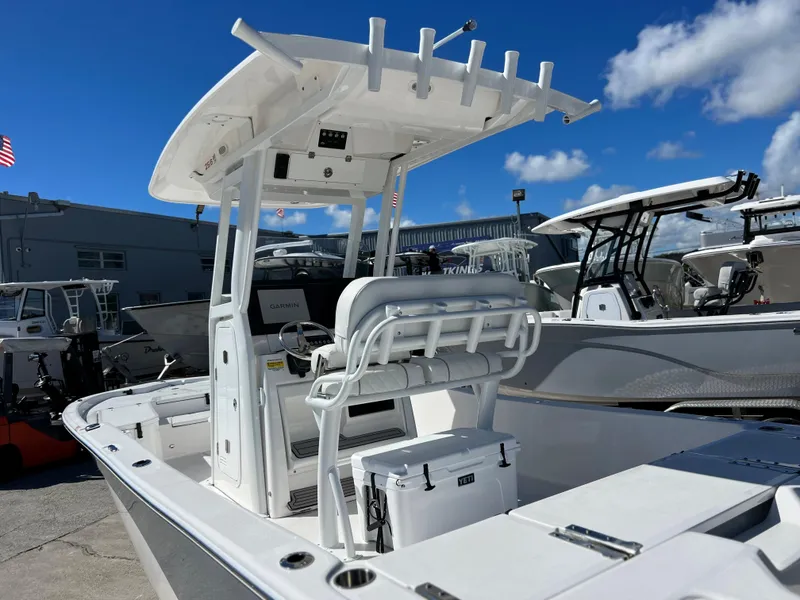 Slide: The Image of 2024 Sea Fox 251 Bay Fox boat at a marina, rear view. - 30