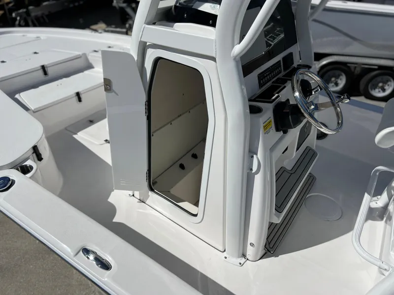 Slide: The Image of 2024 Sea Fox 251 Bay Fox boat interior with console and seating. - 32