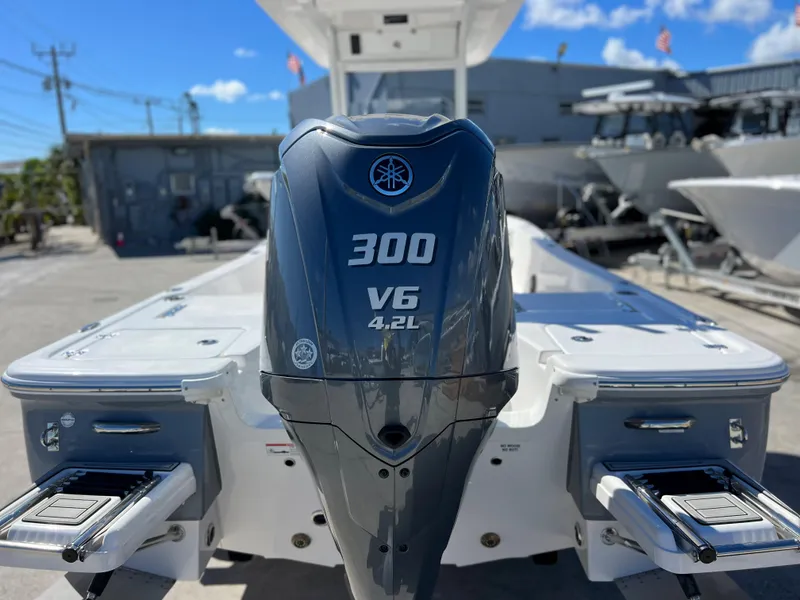 Slide: The Image of 2024 Sea Fox 251 Bay Fox boat interior with console and seating. - 34