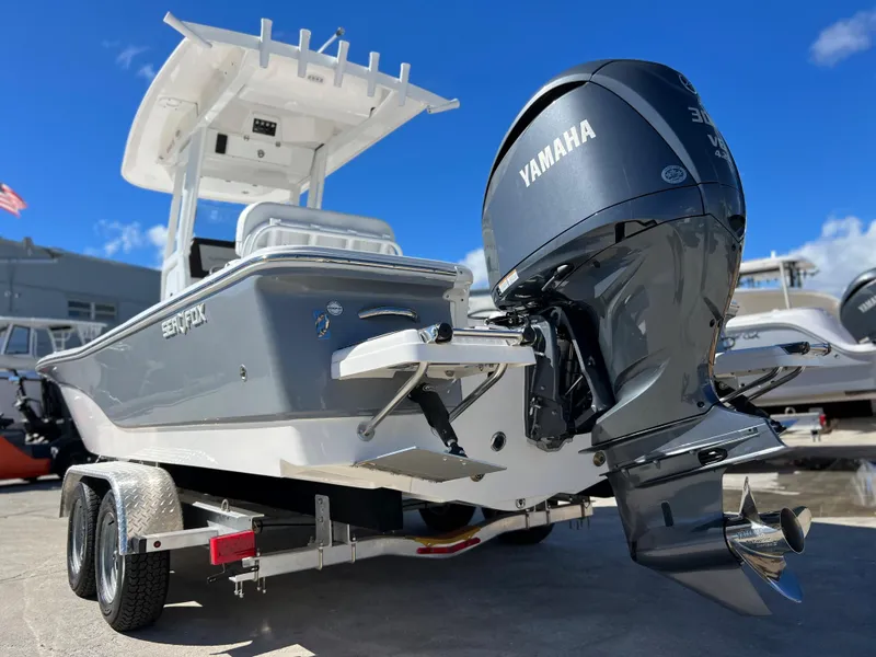 Slide: The Image of 2024 Sea Fox 251 Bay Fox boat with T-top and center console. - 38
