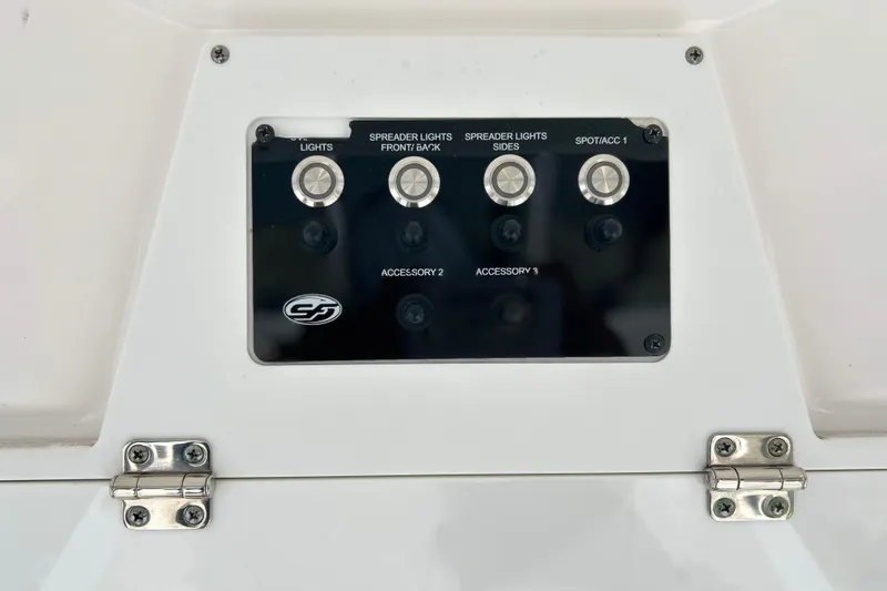 Slide: The Image of Control panel of 2024 Sea Fox 251 Bay Fox boat with switches for lights and accessories. - 57