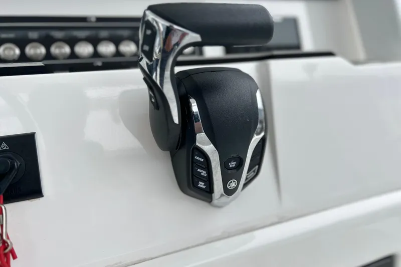Slide: The Image of Close-up of 2024 Sea Fox 251 Bay Fox boat throttle control. - 60