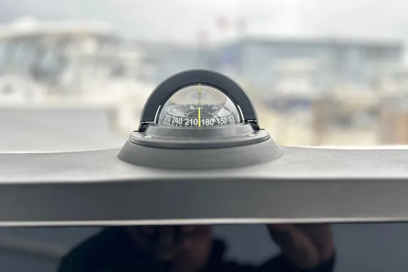 Slide: The Image of Compass on 2024 Sea Fox 251 Bay Fox boat, close-up view. - 61
