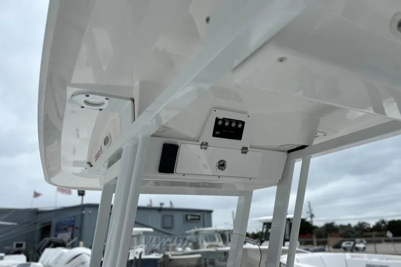 Slide: The Image of 2024 Sea Fox 251 Bay Fox boat console with modern controls and sleek design. - 62