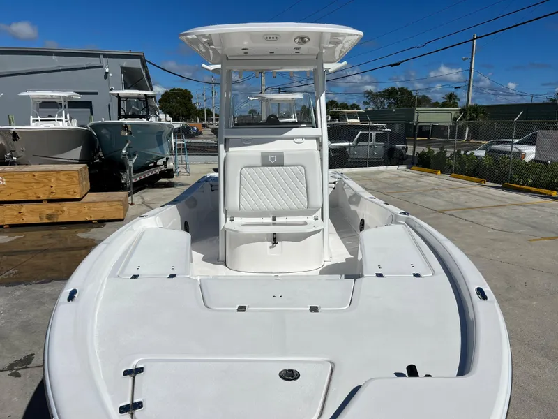 Slide: The Image of 2024 Sea Fox 251 Bay Fox boat on Continental trailer, side view. - 8