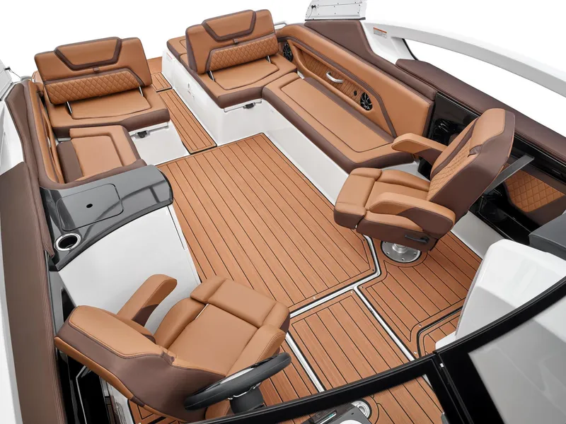 Slide: The Image of 2024 Yamaha Boats 275SE interior with luxurious seating and teak flooring. - 5