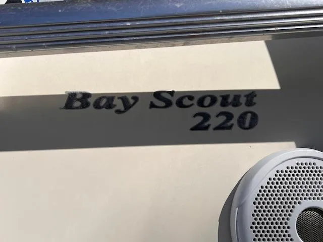 Slide: The Image of 2007 Scout 220 Bay Scout boat model name and speaker. - 12