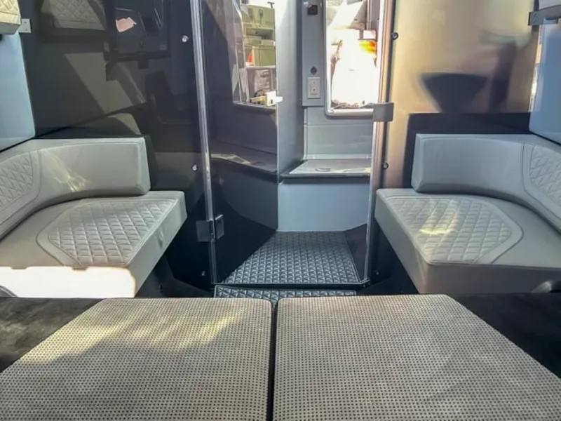 Slide: The Image of Interior of 2024 BRABUS Shadow 900XC with luxurious seating and modern design. - 14