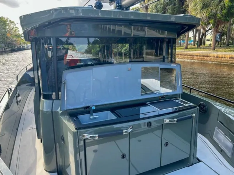Slide: The Image of 2024 BRABUS Shadow 900XC boat with sleek outdoor kitchen setup. - 20