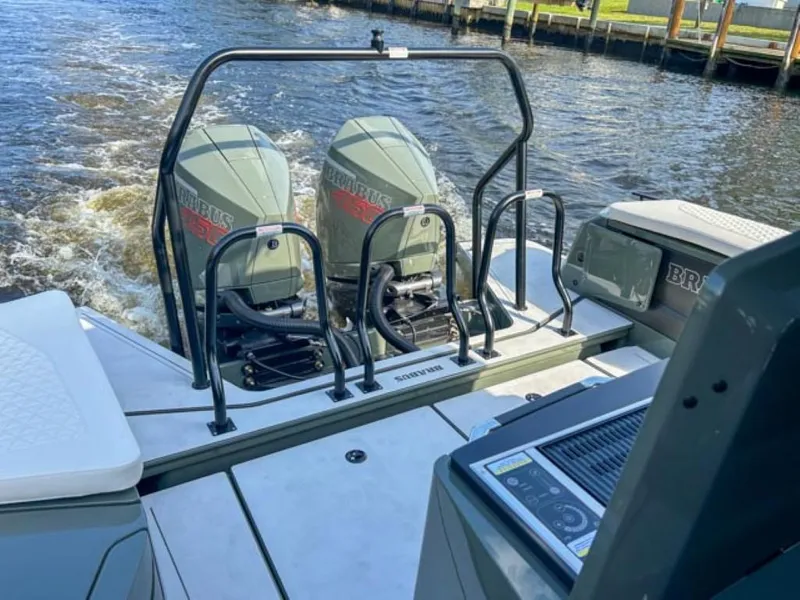 Slide: The Image of 2024 BRABUS Shadow 900XC boat with dual engines on water. - 21