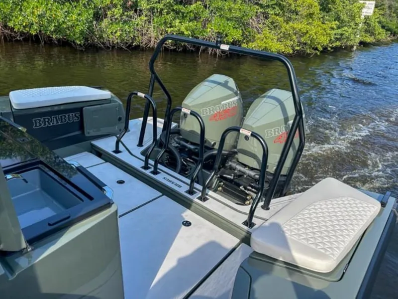 Slide: The Image of 2024 BRABUS Shadow 900XC boat interior with seating and water view. - 22