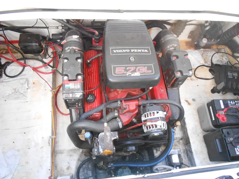 Slide: The Image of 2003 Glastron GS249 boat engine compartment with Volvo Penta 5.7GL engine. - 17