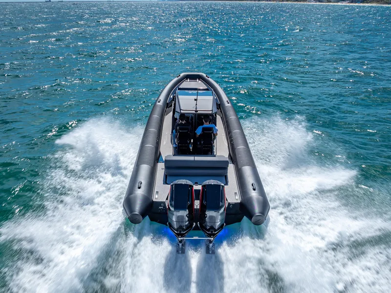 Slide: The Image of 2024 Goldfish X10 Scout boat speeding on open water. - 17