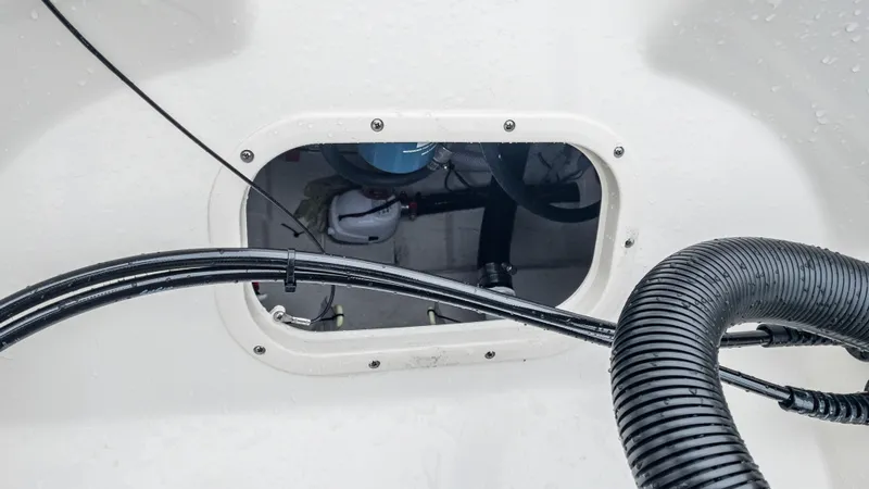 Slide: The Image of Close-up of the 2024 Pathfinder 2300 HPS boat's internal wiring and components. - 17