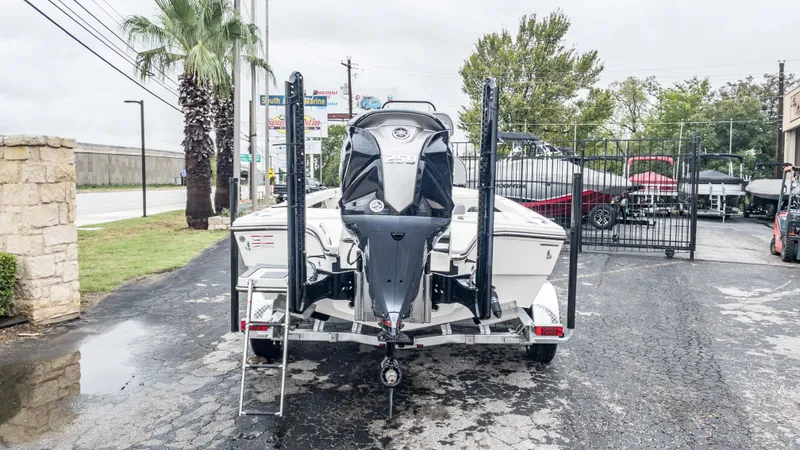 Slide: The Image of 2024 Pathfinder 2300 HPS boat on trailer, rear view with Yamaha 250 engine. - 32