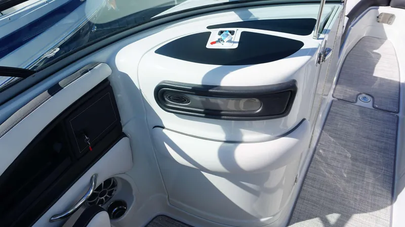 Slide: The Image of 2024 Crownline 290 XSS boat interior, featuring sleek design and modern controls. - 10