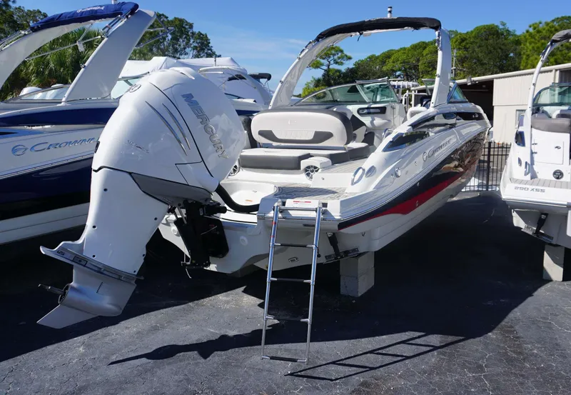 Slide: The Image of 2024 Crownline 290 XSS boat with Mercury outboard engine. - 13