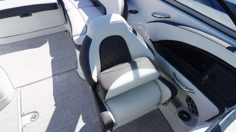 Slide: The Image of 2024 Crownline 290 XSS boat interior with luxurious seating and modern design. - 20