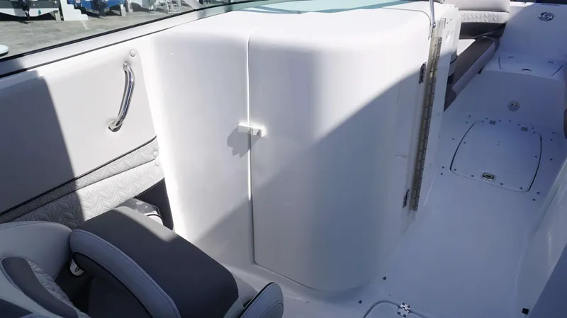 Slide: The Image of Interior view of 2024 Hurricane 2690 SD boat showing seating and storage area. - 11