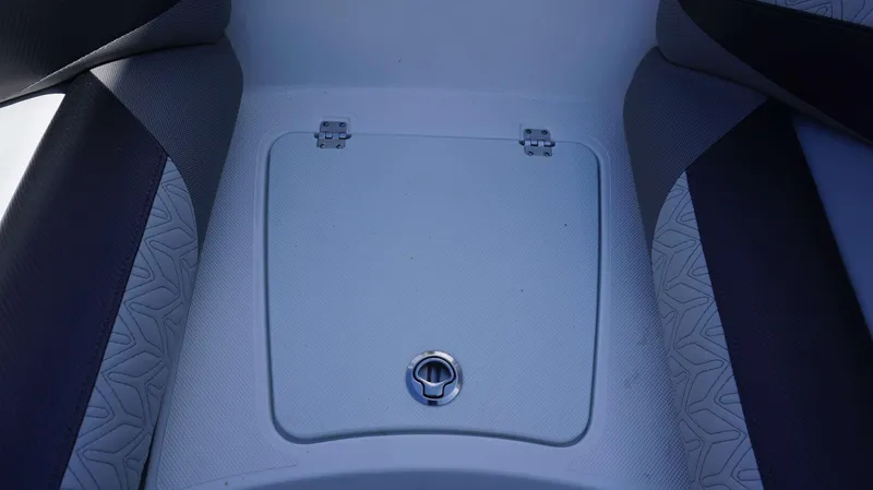 Slide: The Image of 2024 Hurricane 2690 SD boat storage compartment with cushioned seating. - 14