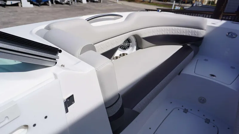 Slide: The Image of 2024 Hurricane 2690 SD boat interior seating area with modern design. - 19