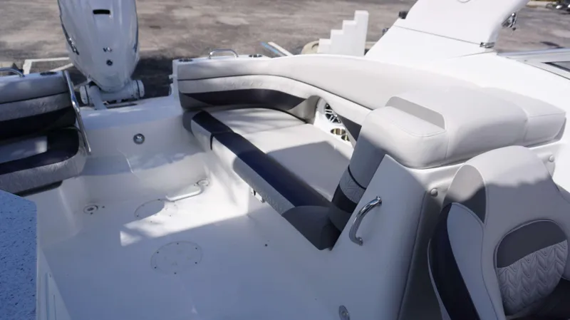 Slide: The Image of Interior seating of 2024 Hurricane 2690 SD boat with white and gray upholstery. - 3