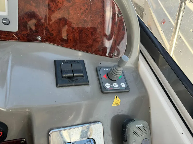 Slide: The Image of Control panel of a 2007 Regal 4060 COMMODORE boat. - 13