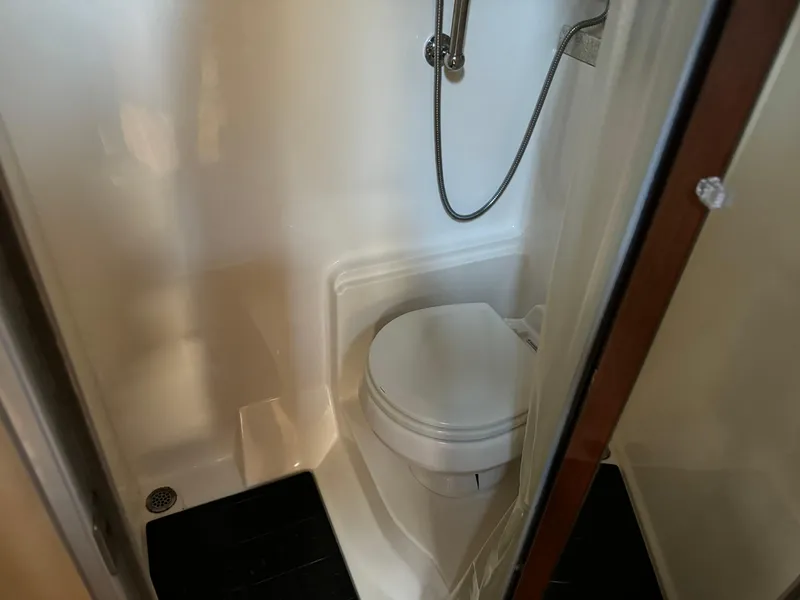 Slide: The Image of 2007 Regal 4060 COMMODORE yacht bathroom with toilet and shower. - 26
