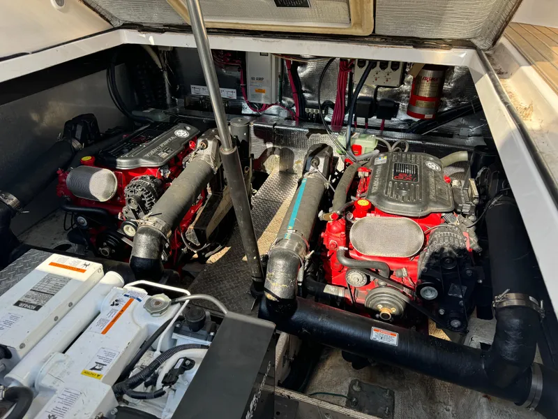 Slide: The Image of 2007 Regal 4060 COMMODORE engine compartment with dual engines and mechanical components. - 27