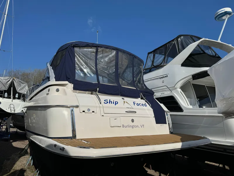 Slide: The Image of 2007 Regal 4060 COMMODORE boat docked, named Ship Faced, Burlington, VT. - 3