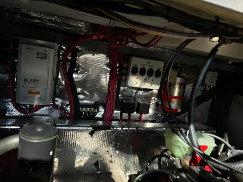 Slide: The Image of Engine compartment of a 2007 Regal 4060 COMMODORE boat with electrical components. - 30