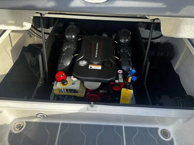 Slide: The Image of 2024 Regal LS4 boat engine compartment with Volvo Penta engine. - 10