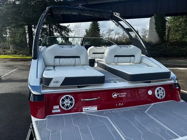 Slide: The Image of 2024 Regal LS4 boat with white and red seating, rear view. - 5