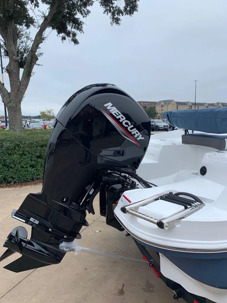 Slide: The Image of 2024 Tahoe 185 S boat with Mercury outboard motor. - 6