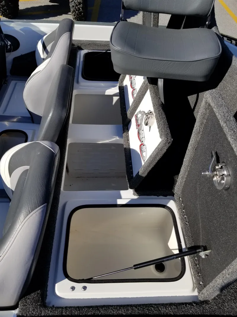 Slide: The Image of 2014 Legend Boats ALPHA 191 SCX interior storage compartments and seating. - 11