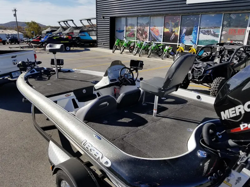 Slide: The Image of 2014 Legend Boats ALPHA 191 SCX fishing boat with Mercury engine in dealership lot. - 13